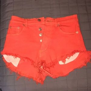Orange high rise denim shorts